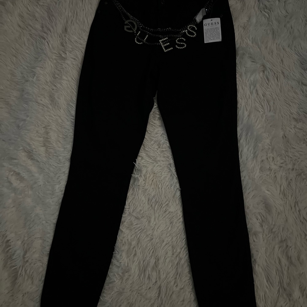 Beautiful black Guess Jeans with a chain  belt.